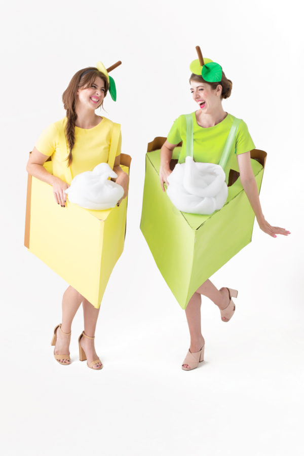 Two woman dressed as pie slices
