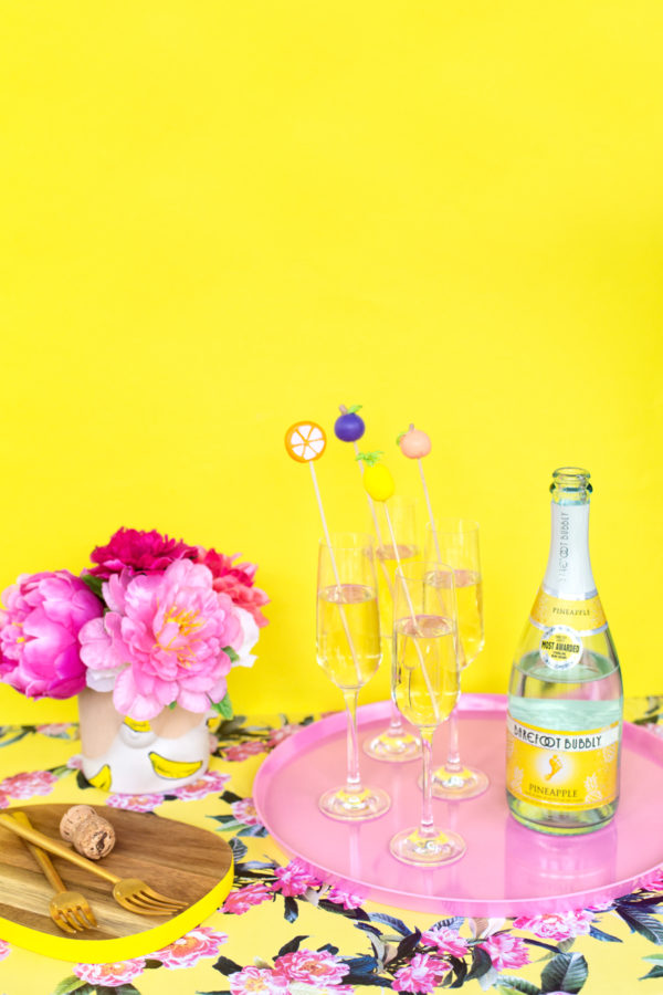 Glasses, flowers, and a bottle