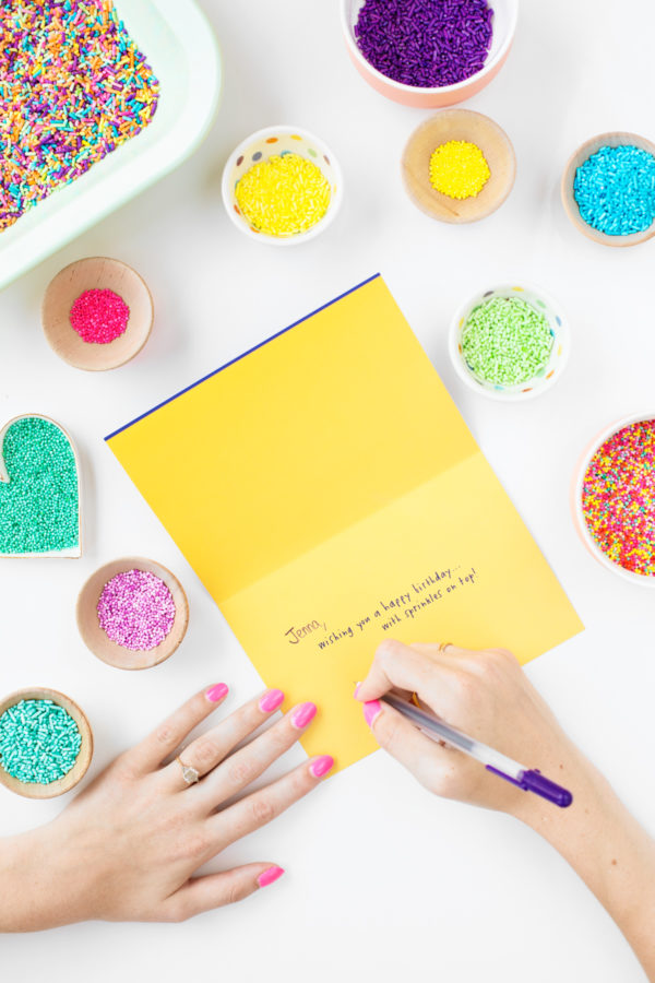 Yellow card and sprinkle containers
