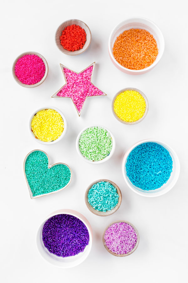 Containers with colorful sprinkles 