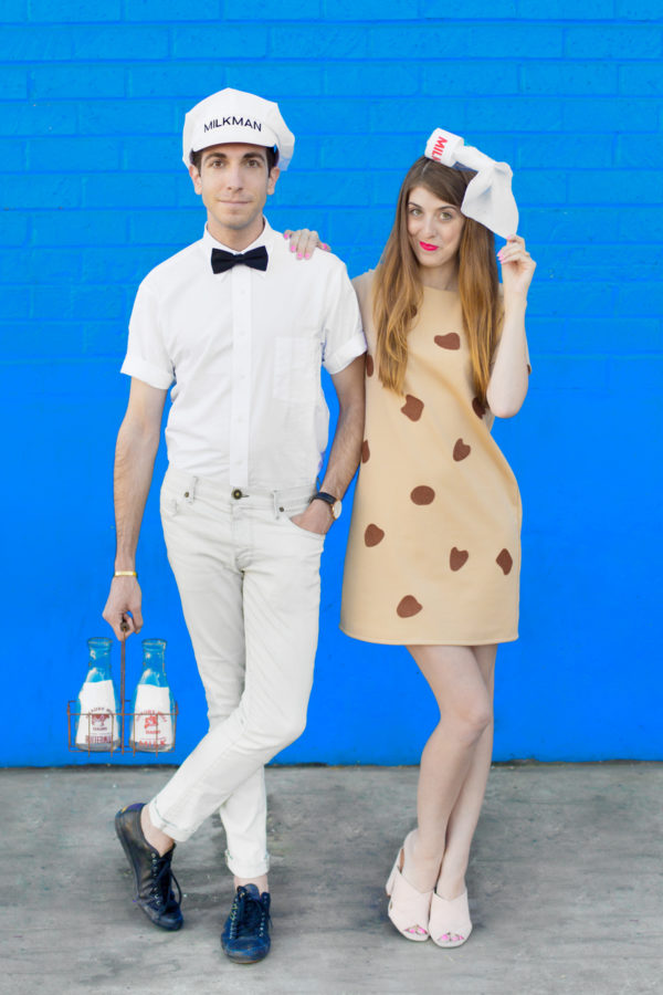 A woman dressed as a cookie and a man dressed as a milk man