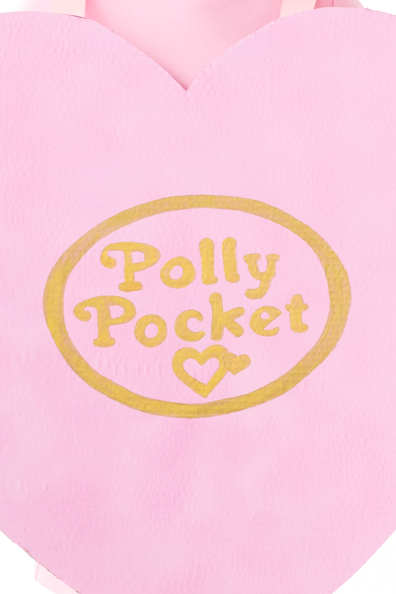 "Polly Pocket" written in gold paint on a pink wall
