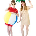 Two women wearing beach costumes
