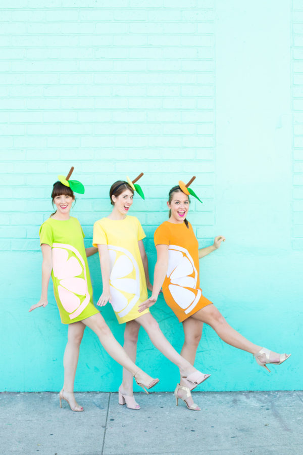 Three girls wearing fruit costumes