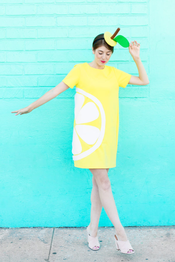 A woman dressed up as a lemon