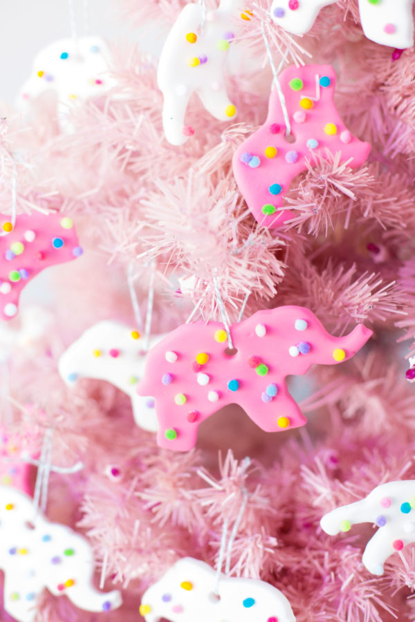 Circus animal cookie ornaments on a pink tree