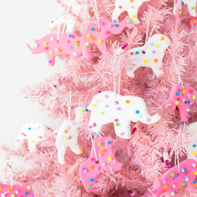 Circus animal cookie ornaments on a pink tree