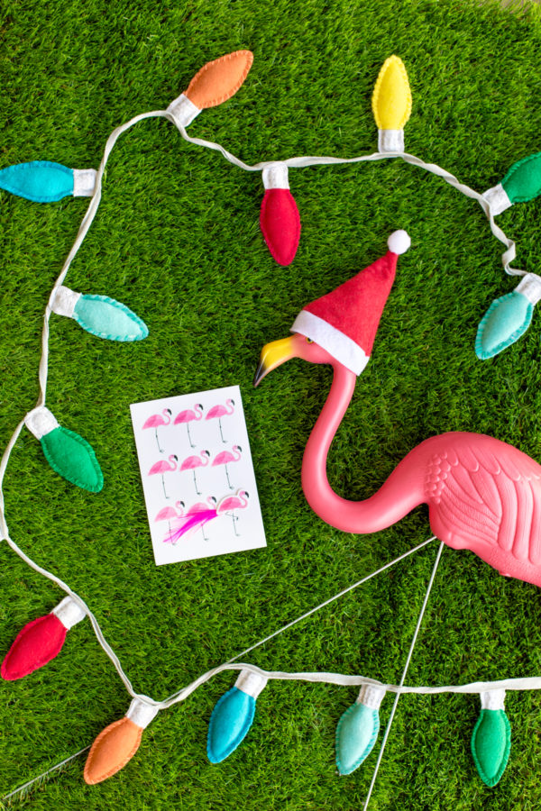 A flamingo and fake lights on turf