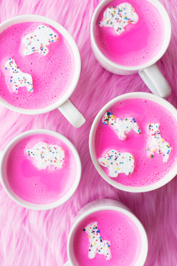 Mugs with pink liquid in it