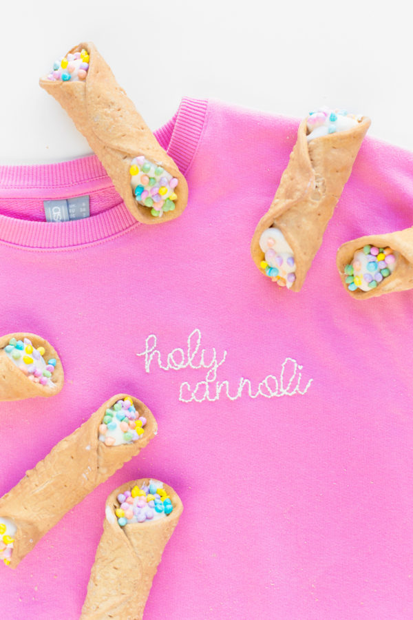A pink crew neck and cannolis 