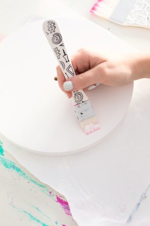 Someone painting a circle item