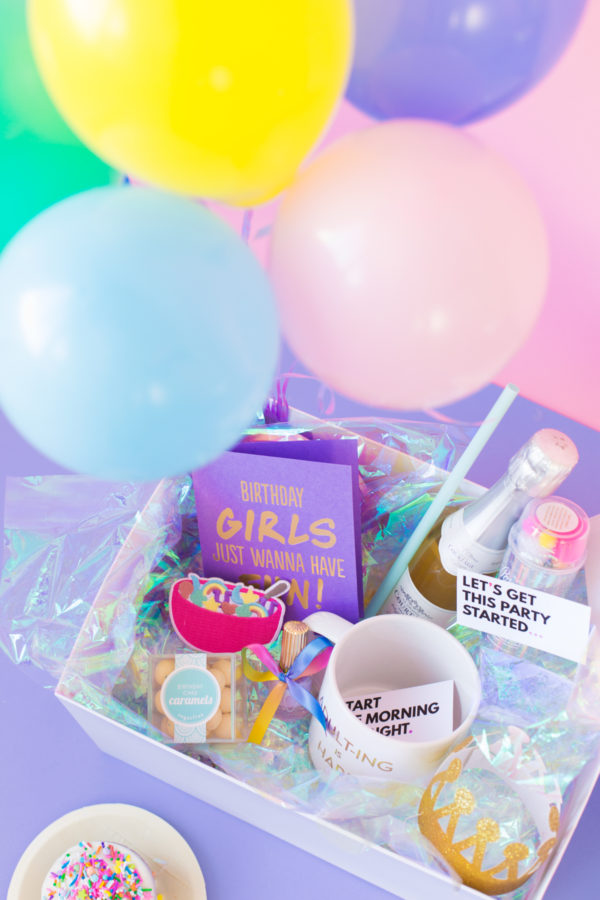 Box with balloons and gifts