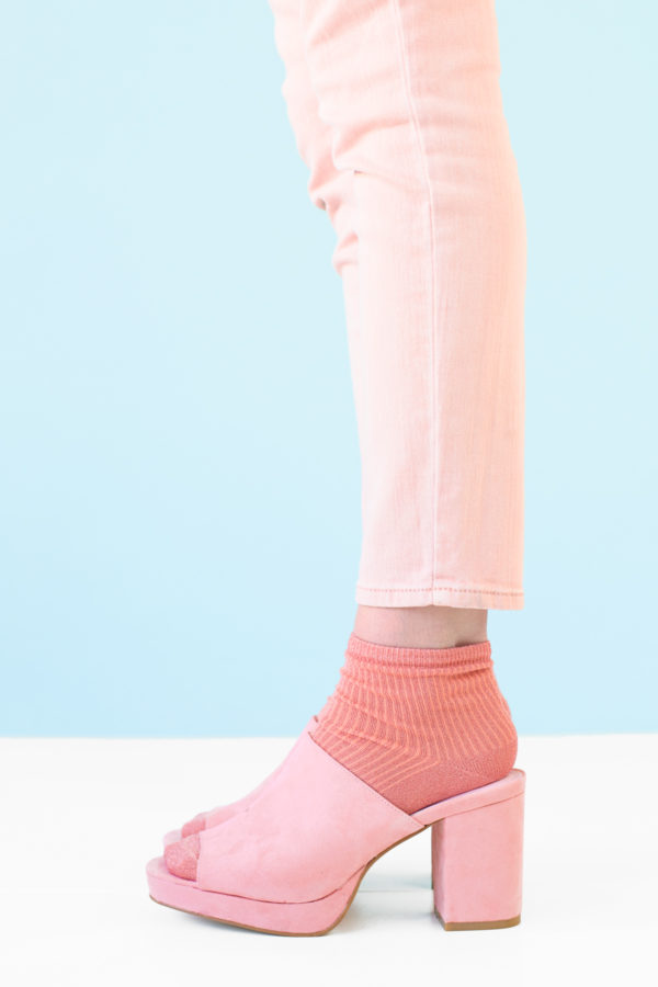 Pink jeans, pink socks, and pink shoes