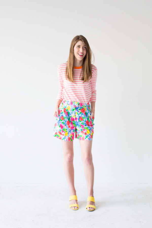 A girl wearing a stripped shirt and shorts