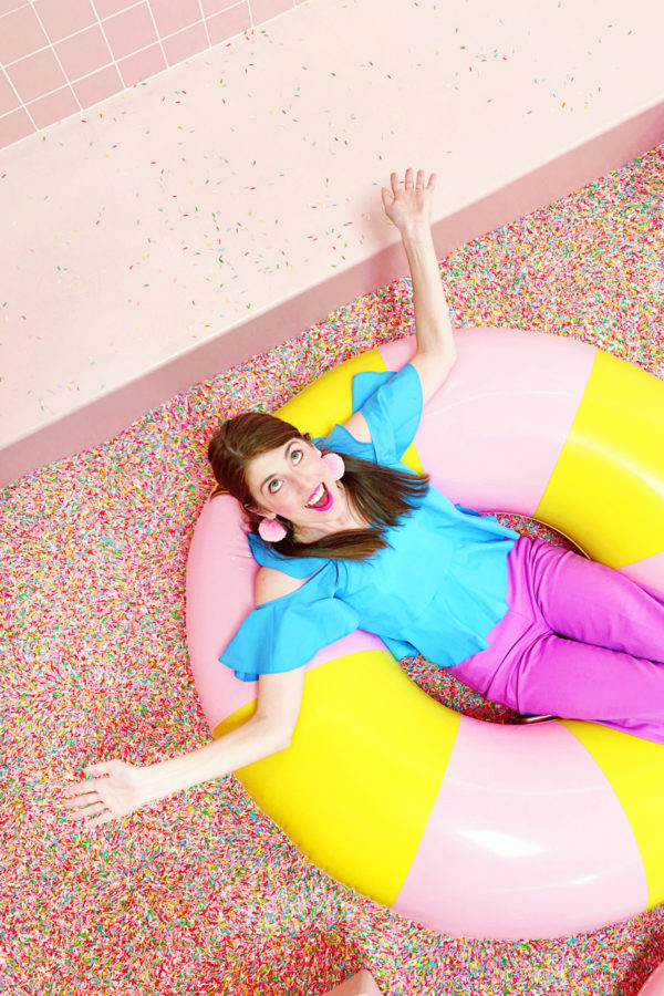 A pool full of sprinkles and a girl