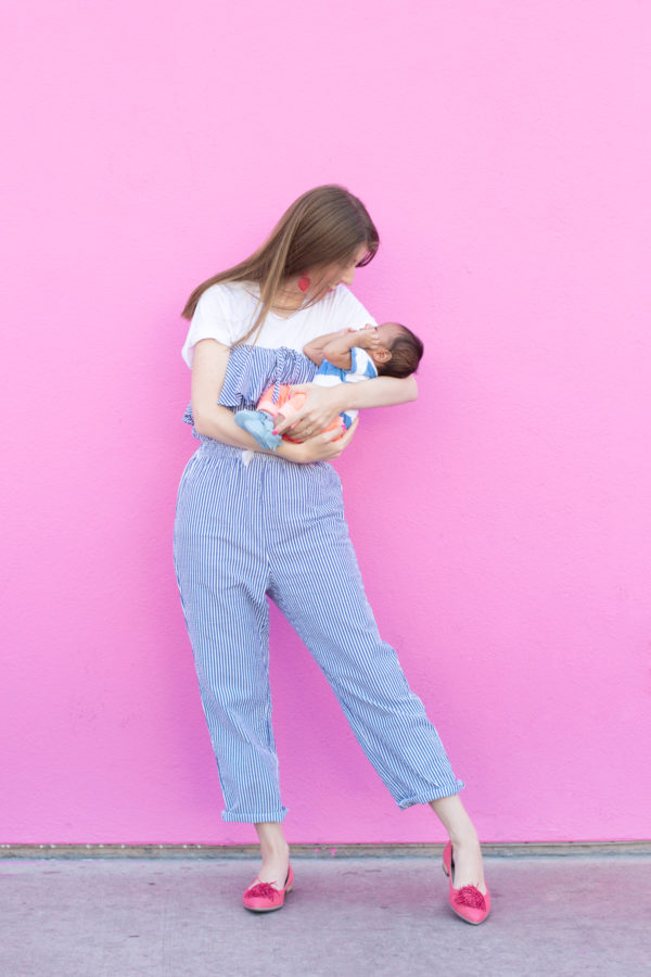 A woman holding a baby