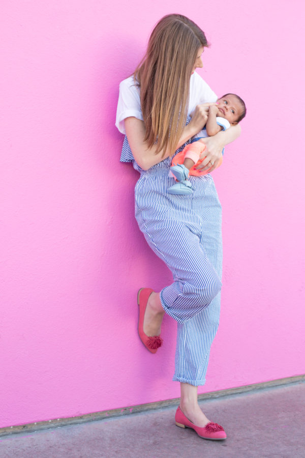 A woman holding a baby