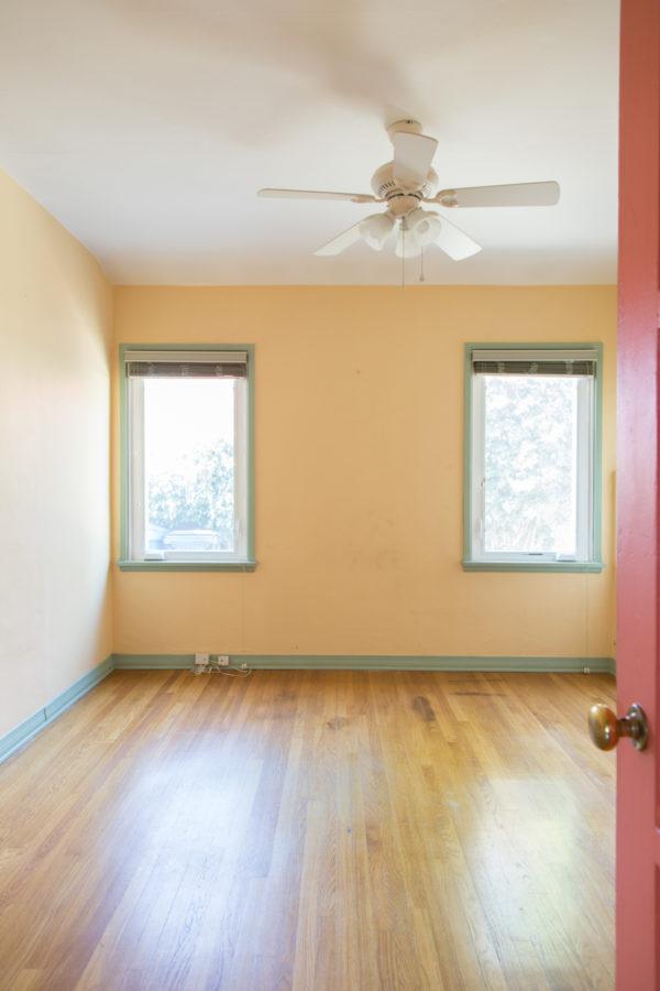 A room with a hard wood floor