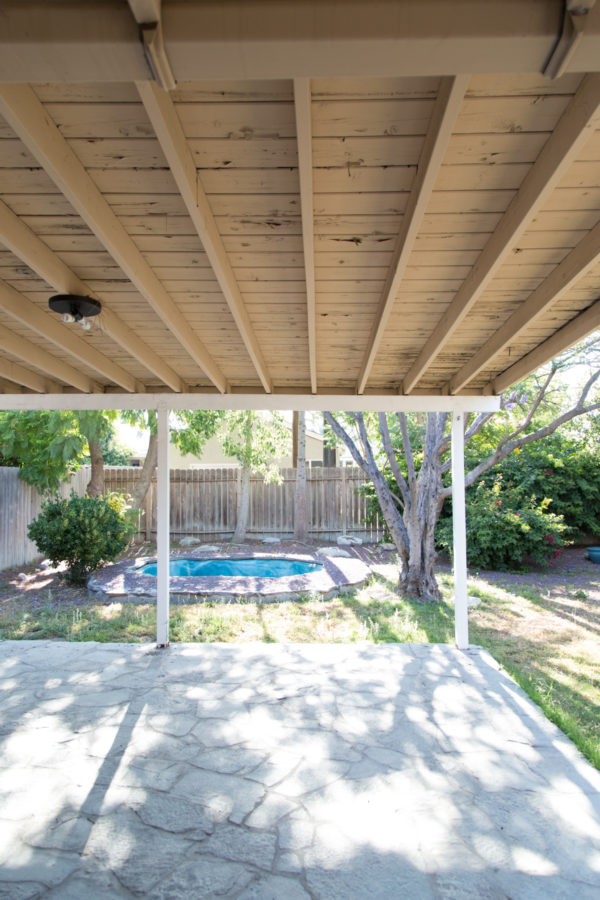 A back porch and grass