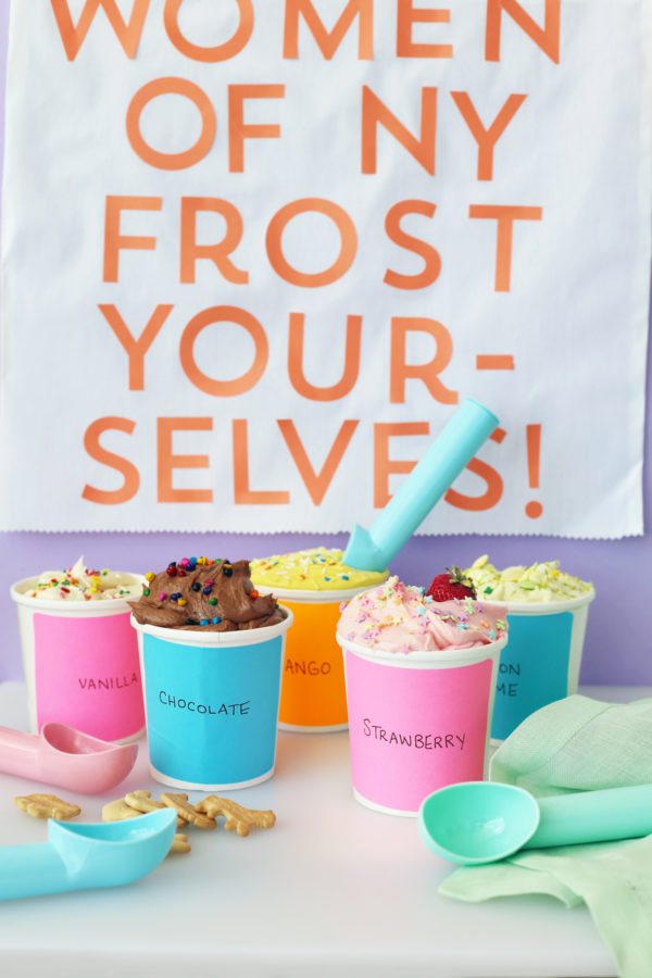 Colorful cups with snacks in them 