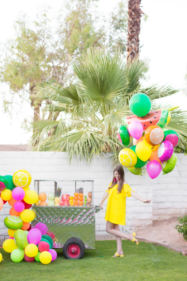 People holding balloons