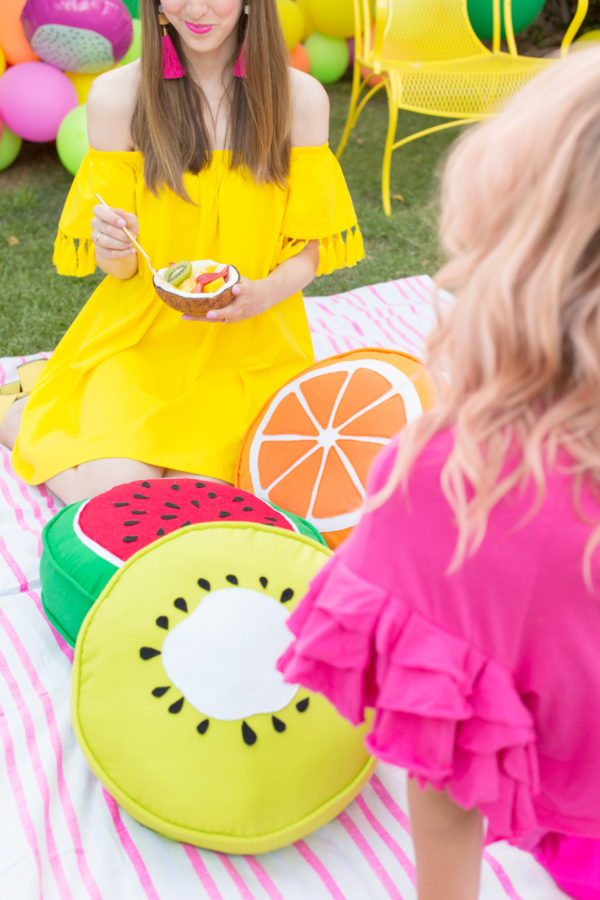 People and fruit pillows