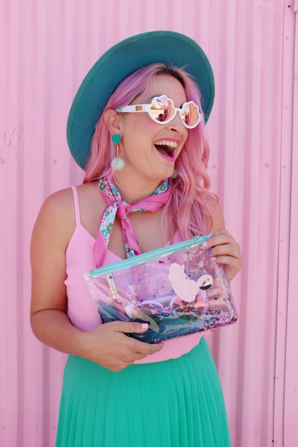 A girl holding an ocean clutch 