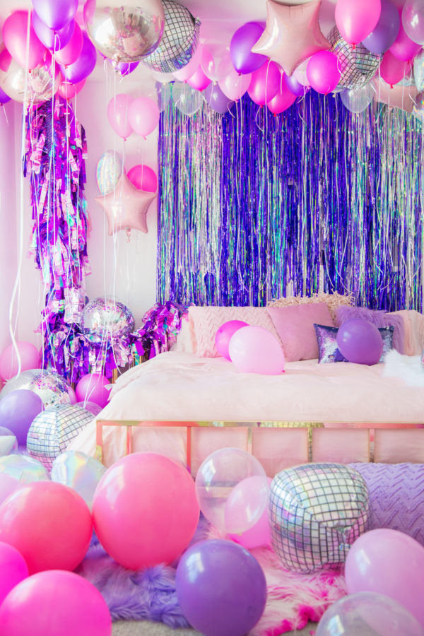 A room with balloons and decor 