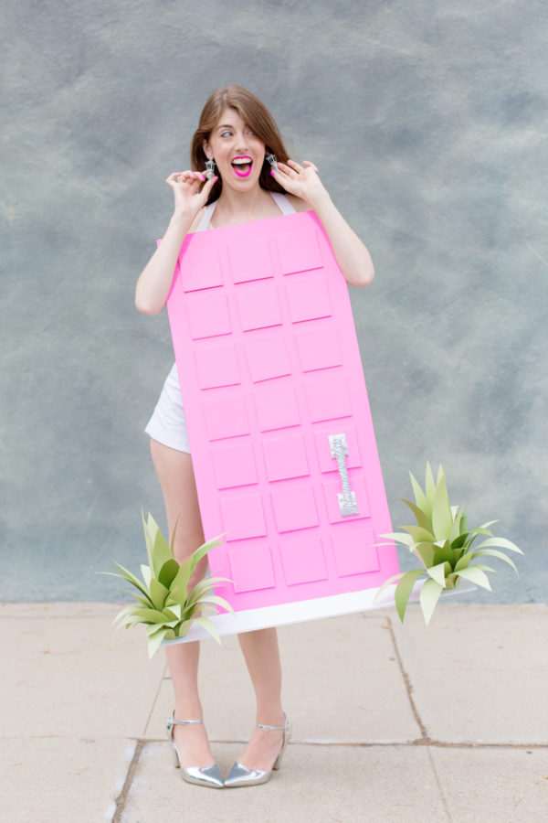 A woman dressed as a door