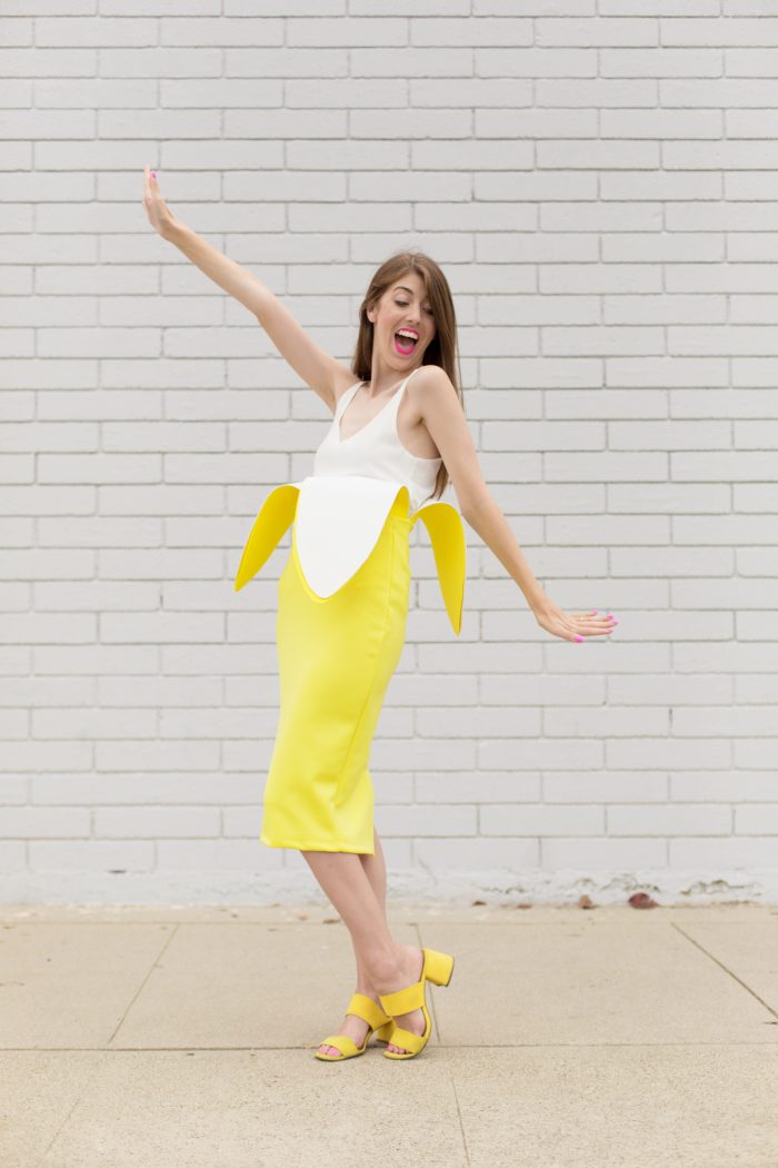 A girl wearing a banana costume