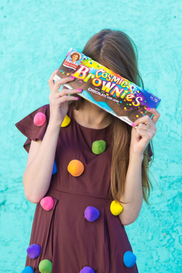A person wearing a cosmic brownie costume