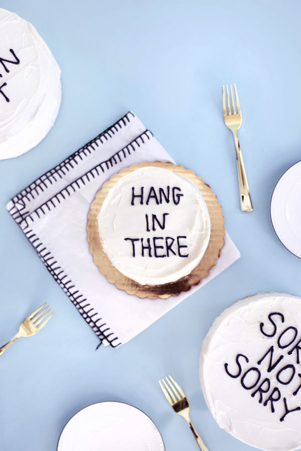 Cake that says \"hang in there\"