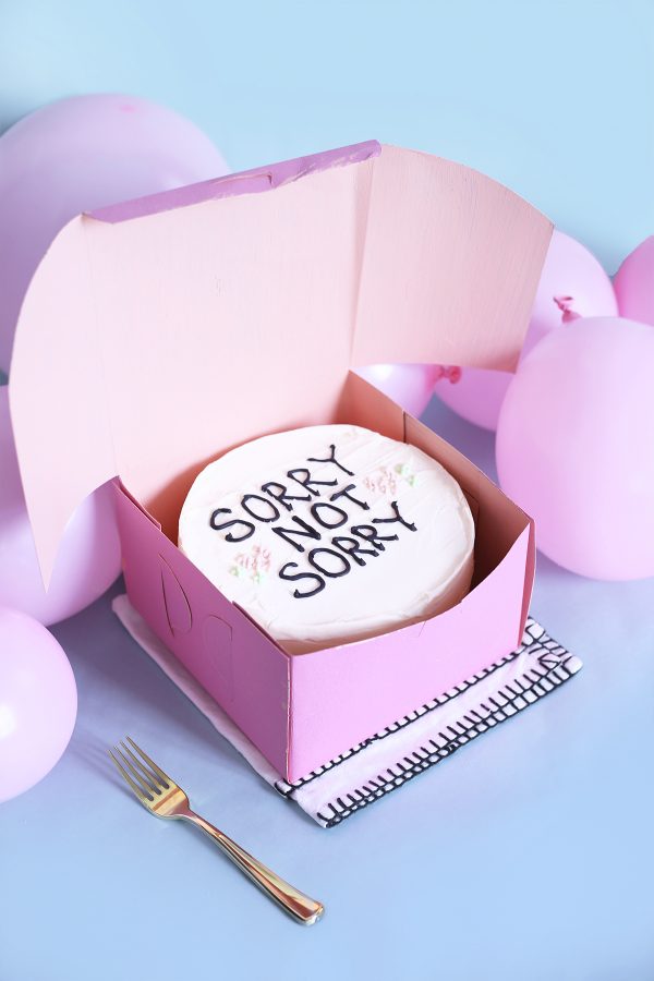 Cake that says sorry not sorry