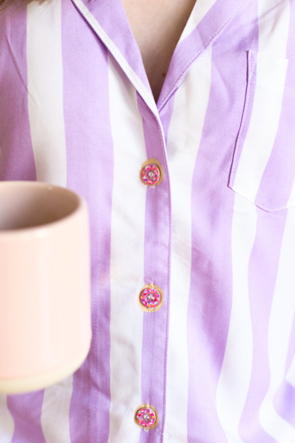 A purple and white button up shirt