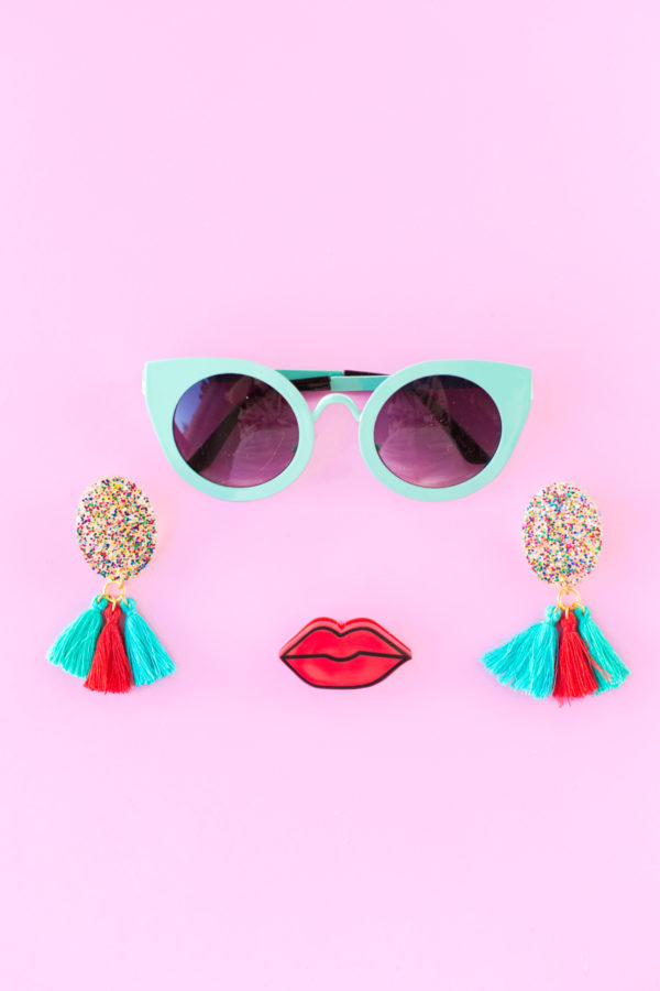 Aqua glasses and glitter tassel earrings
