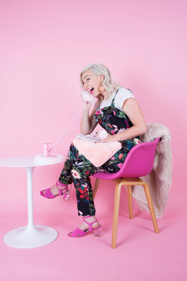 A woman sitting on a table