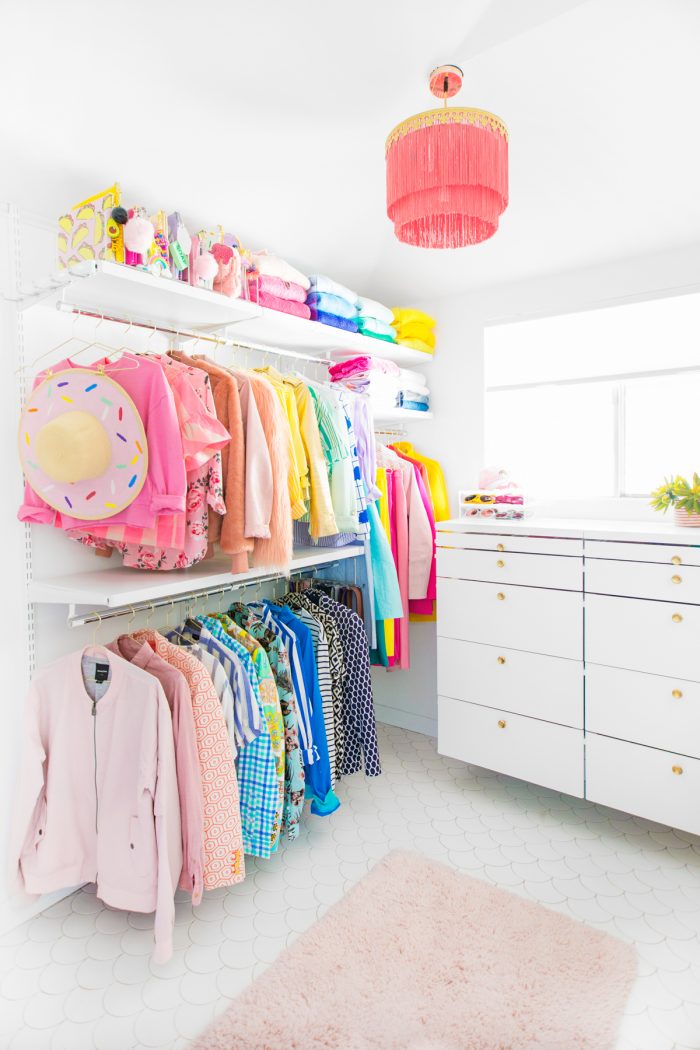 Colorful clothes in a closet