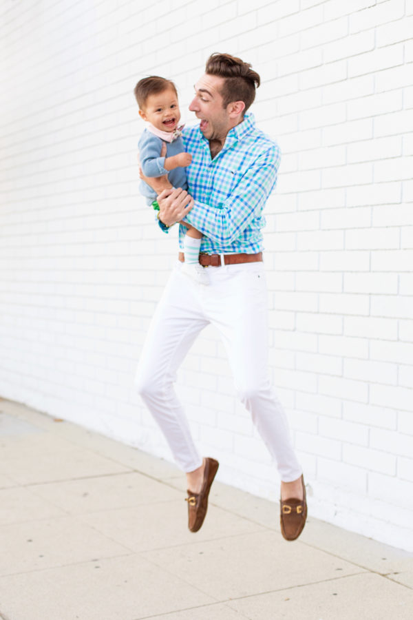 A man holding a little boy