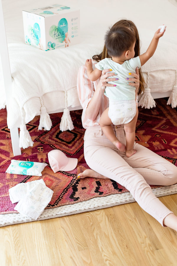 Two people sitting on a rug