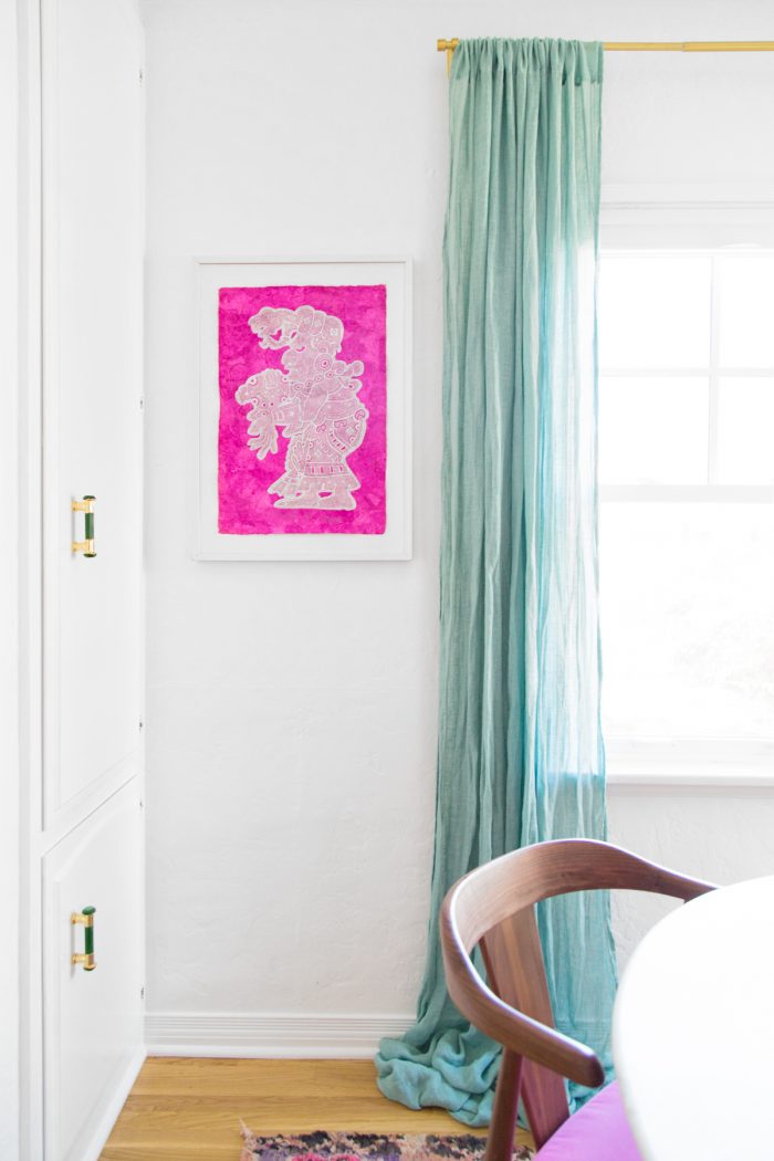 A room with pink art