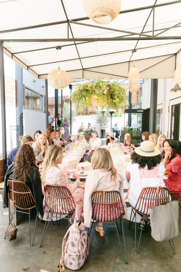 A group of people sitting at a table 