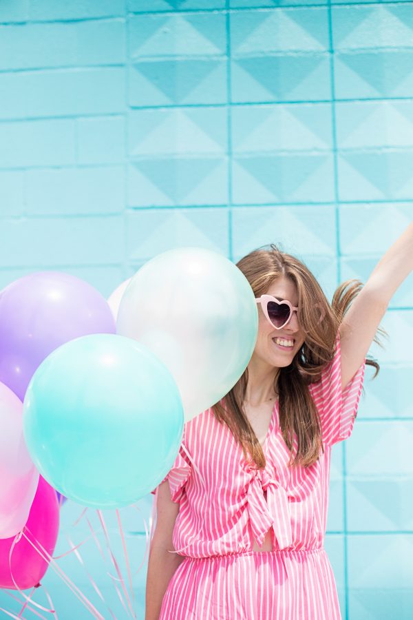 A woman wearing a pink shirt