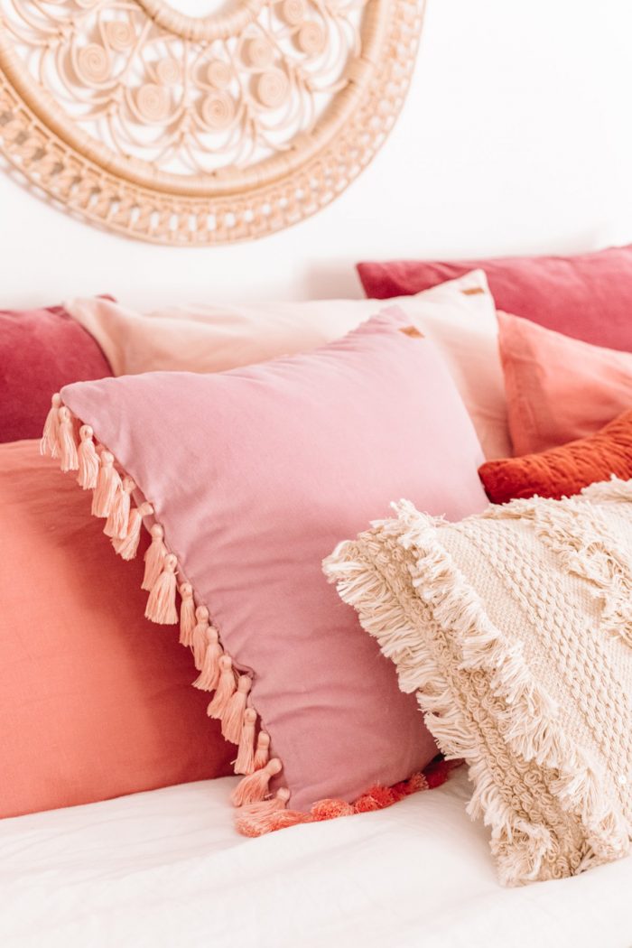 Pink pillows on a bed