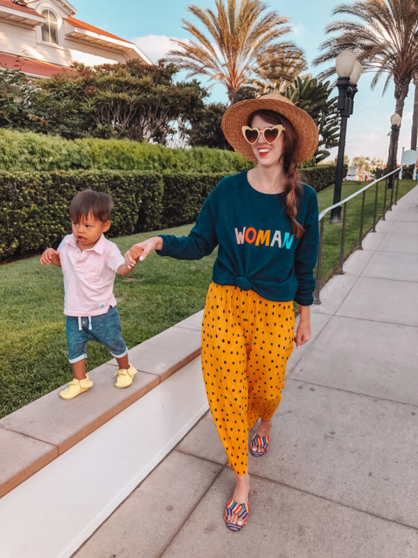 A little boy and woman walking