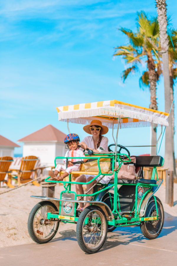 Two people riding in a carriage