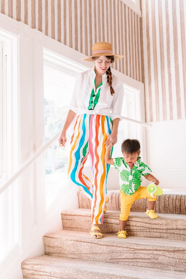 Two people walking down stairs