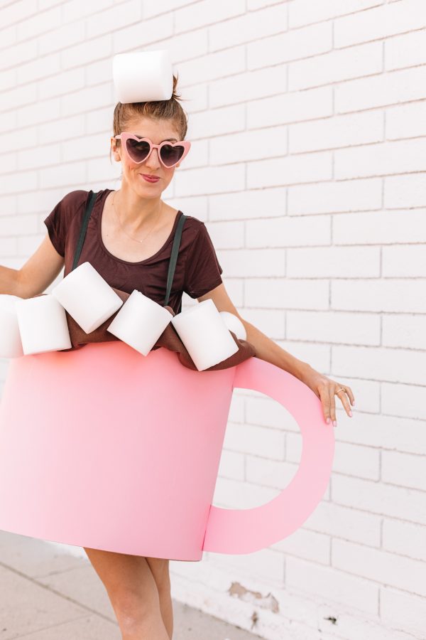 A woman posing for a picture dressed as hot chocolate