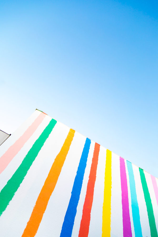 A close-up of a rainbow wall