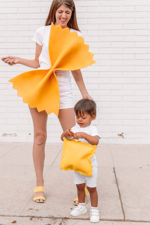 Two people dressed as pasta