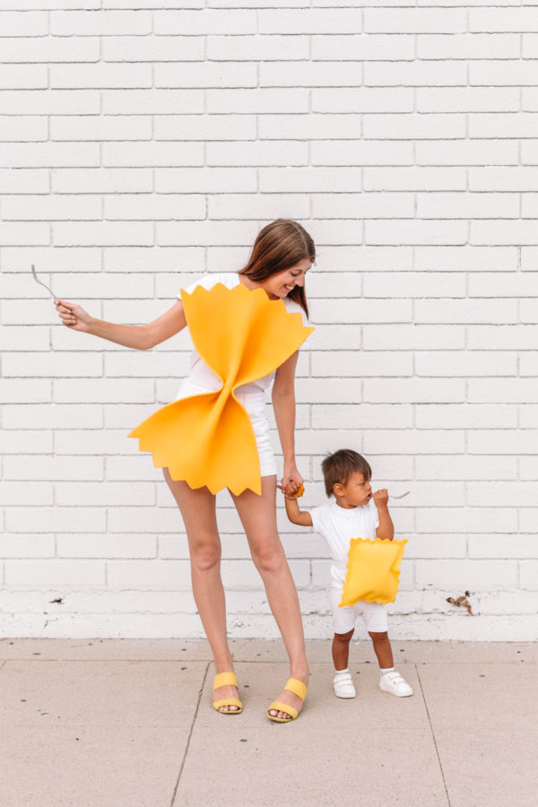 Woman and boy dressed as pasta